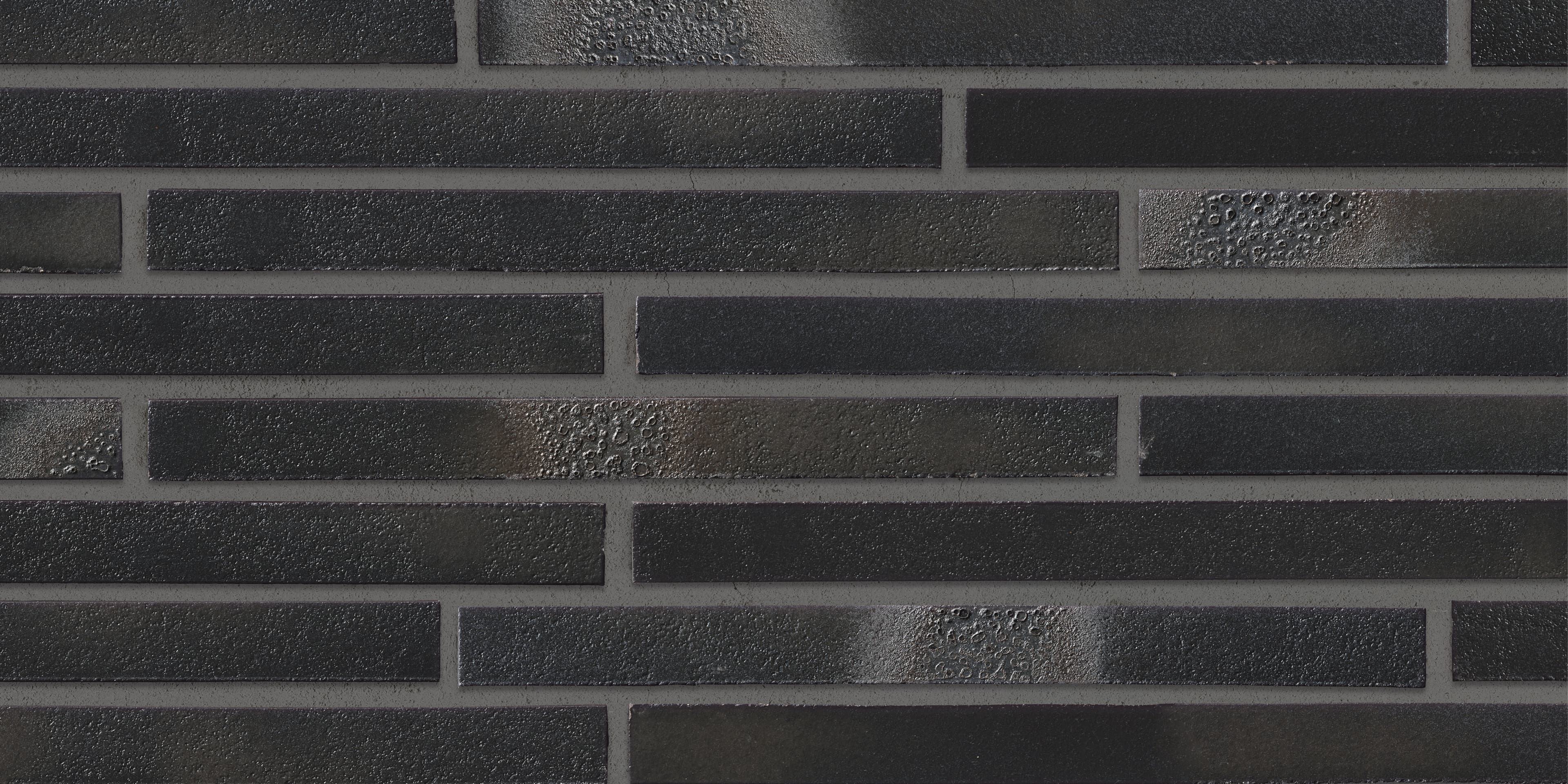 Плитка фасадная клинкерная Stroeher Riegel 50 456 schwarz-blue, 490*40*14 мм - Image 1